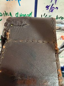 Wassily chair, showing damaged arm panel