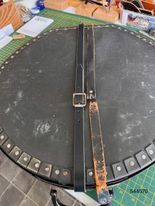 Cymbal case showing old strap and new replacement